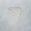 Spilla in acciaio con perle e strass – SP13